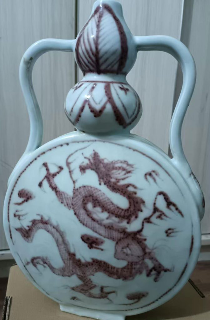 图片[1]-Glazed red flat bottle-国际艺术品交易网