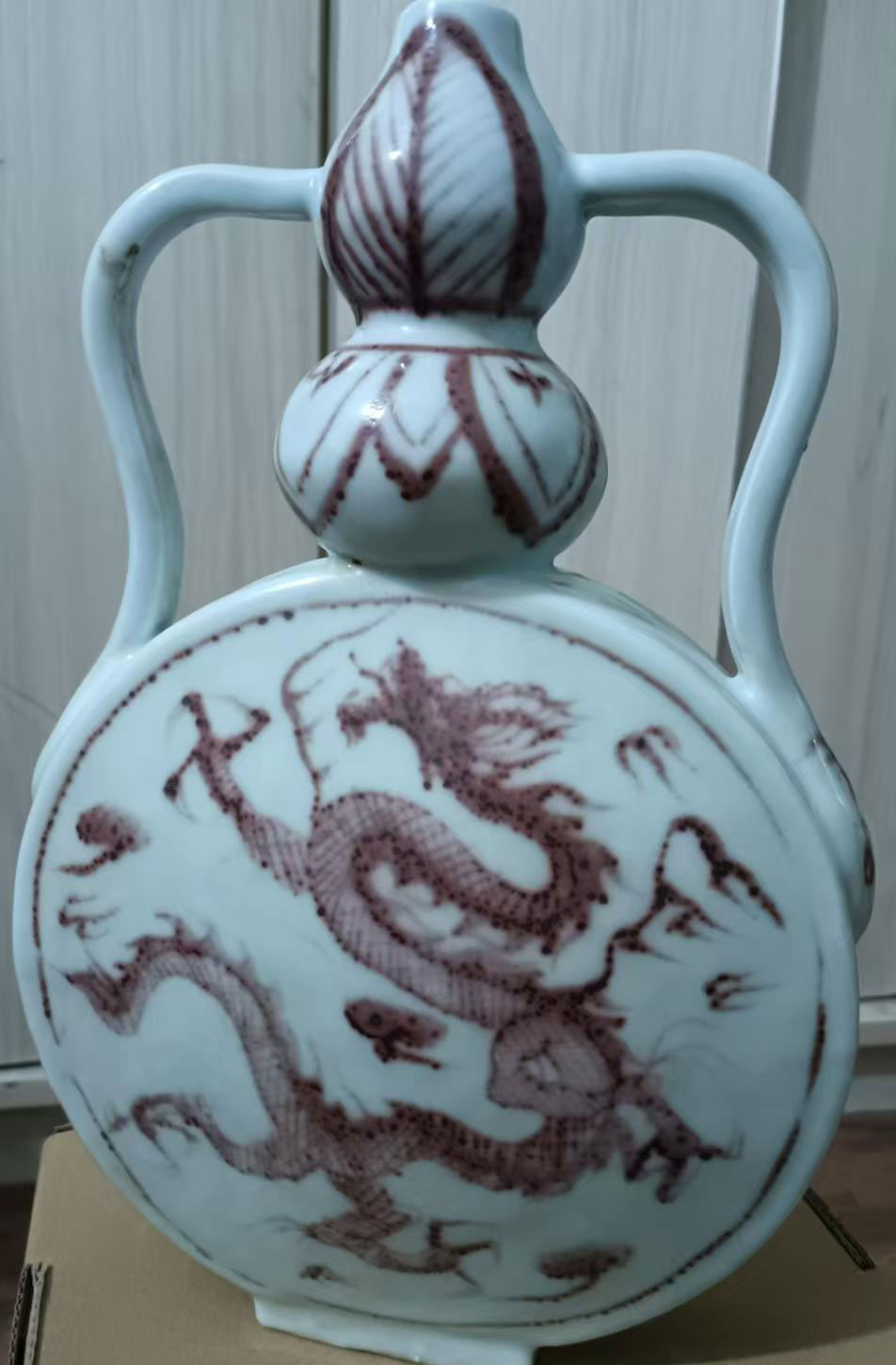 Glazed red flat bottle-国际艺术品交易网