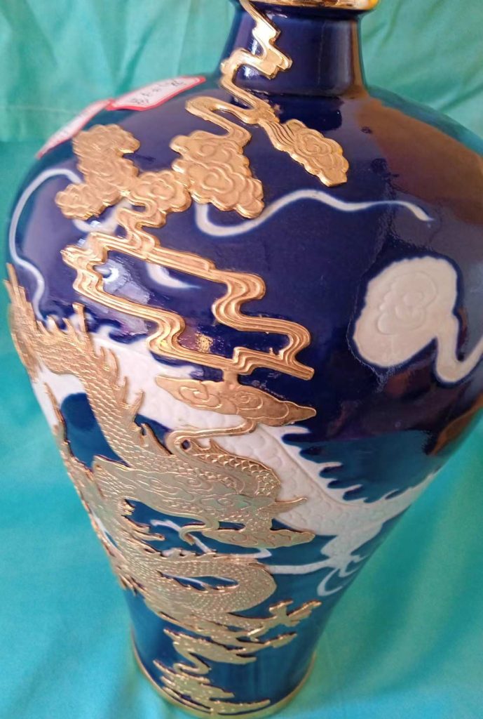 图片[1]-Yuan Dynasty blue glaze dragon pattern plum bottle-国际艺术品交易网