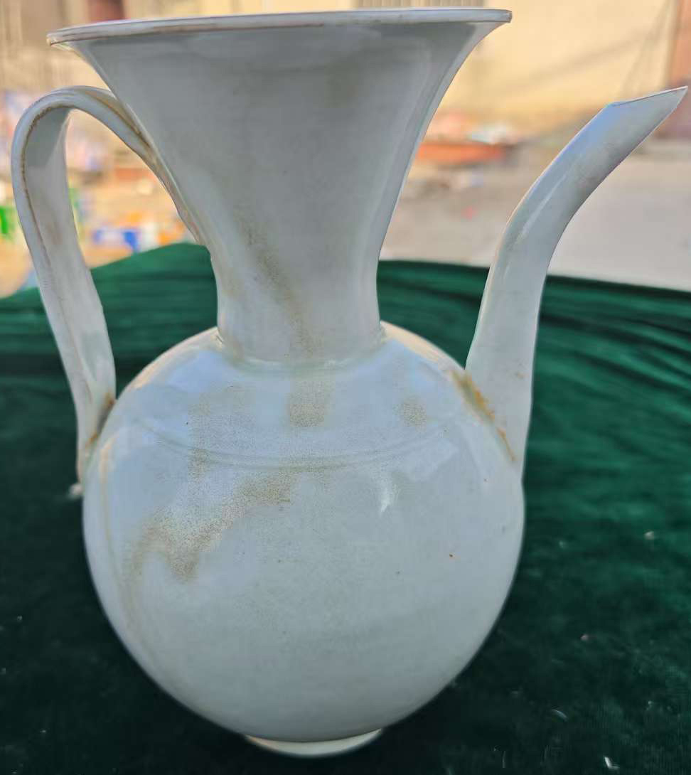In the Song Dynasty, Hutian kiln shadow celadon curled the mouth and held the pot-国际艺术品交易网